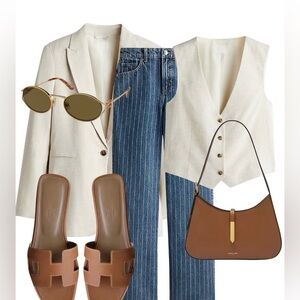 American Eagle Denim and white stripe jeans. 100% cotton. Waist-13.5”.